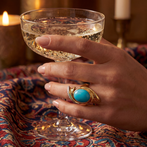 Firouzeh Turquoise Cocktail Ring in dramatic evening lighting