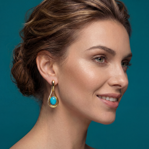 Firouzeh Turquoise Drop Earrings profile view, showing movement