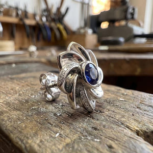 Gol-e Behesht earrings on display, 18ct white gold Persian garden jewellery