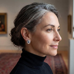 Gol-e Behesht earrings pair view, sculptural rose design in white gold