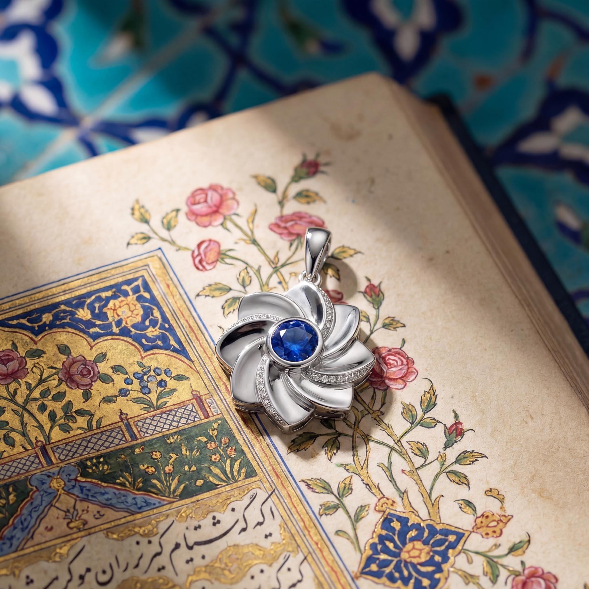 Gol-e Behesht pendant close-up showing eight-petal design and sapphire