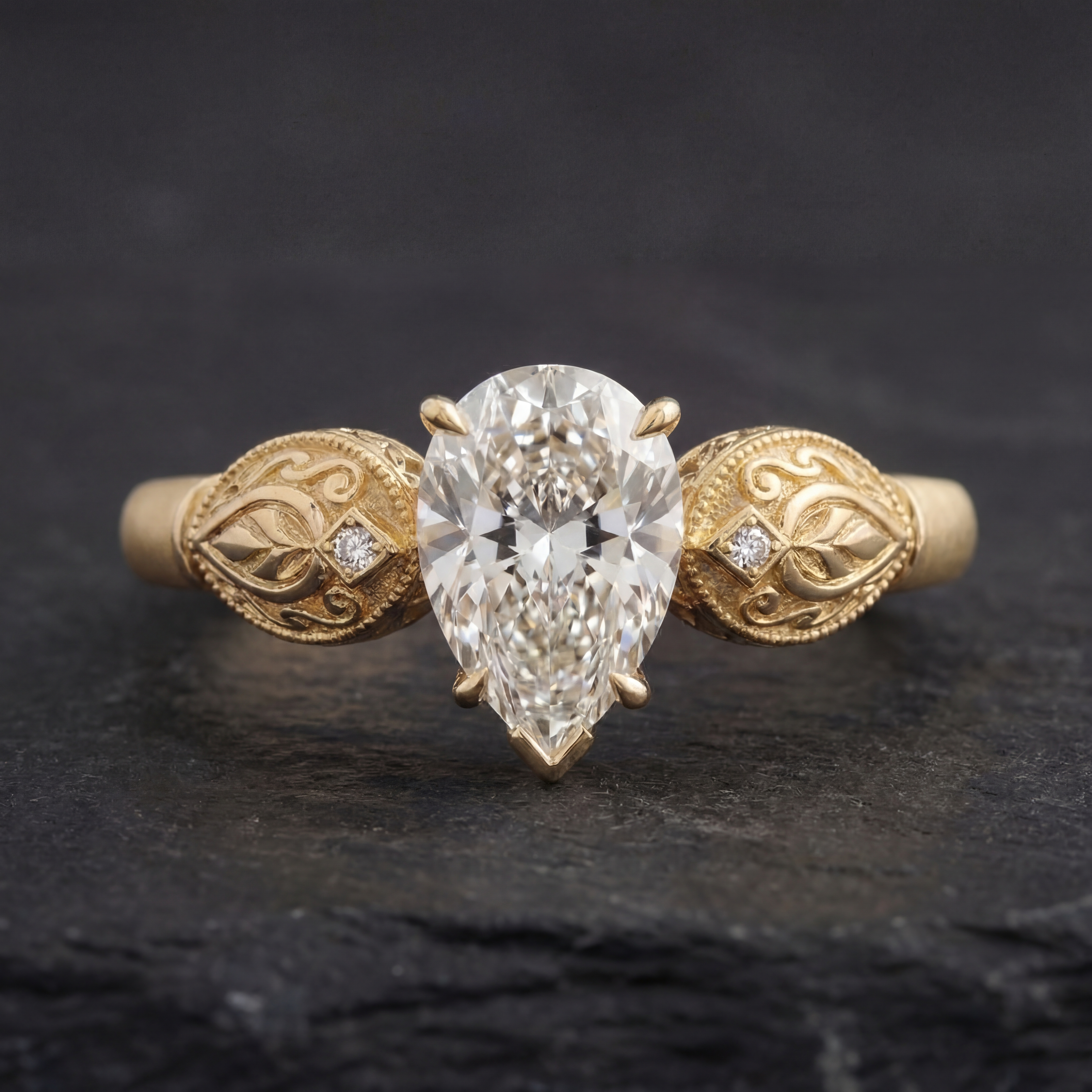 Sepideh engagement ring - top down view showing pear diamond orientation and boteh motifs on shoulders