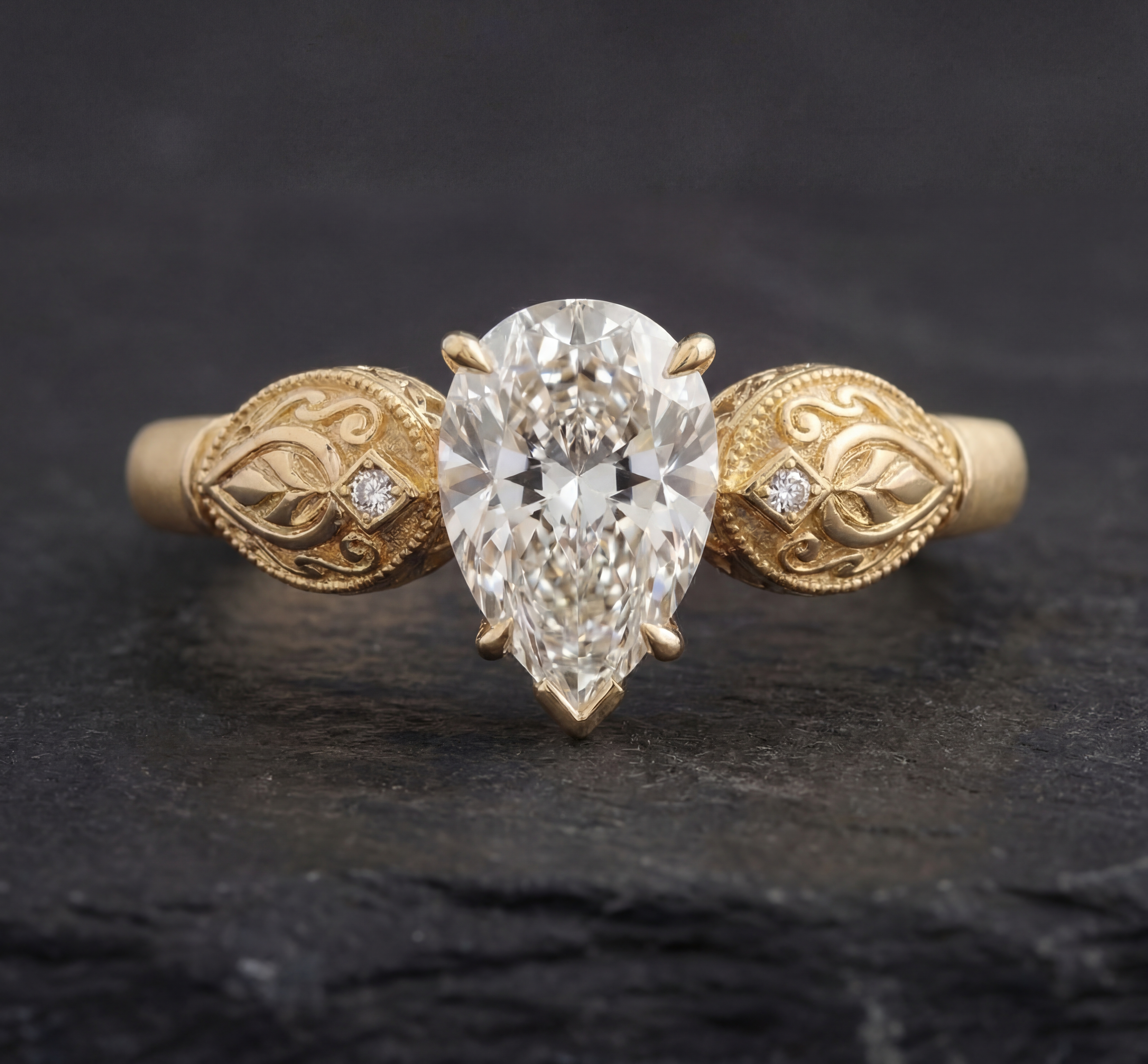 Sepideh engagement ring - top down view showing pear diamond orientation and boteh motifs on shoulders