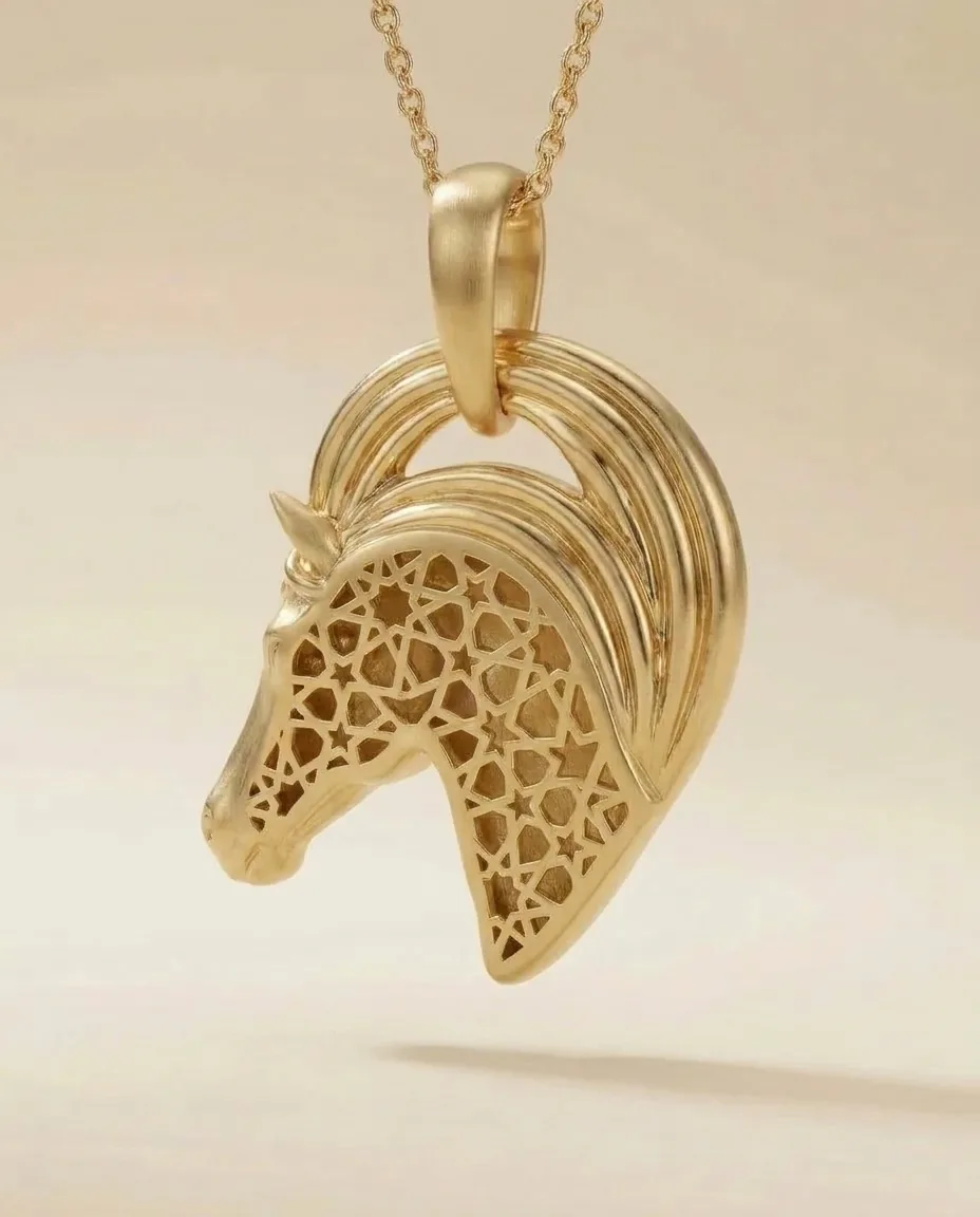 The reverse of the Rakhsh pendant in solid gold, the girih gallery pierced through the horse's silhouette