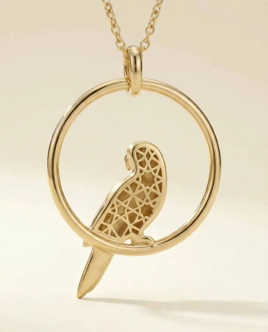 The Tuti pendant from the reverse: the girih gallery cut clean through the bird, finished to the same standard as the front.