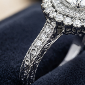 Roshanak engagement ring - detail shot showing islimi arabesque shoulder engraving