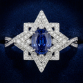 Kohestar Engagement Ring - Hero view, oval sapphire in shamseh star setting, 18ct white gold