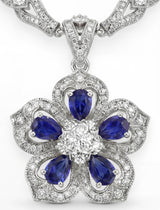 Gol-e Sefid platinum pendant with vivid blue sapphire and diamond halo by Silux London