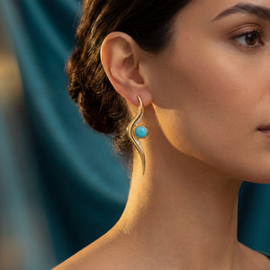 Firouzeh Turquoise Ribbon Drop Earrings lifestyle shot, editorial styling