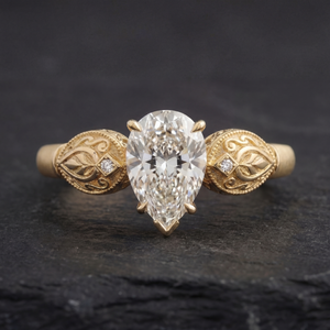 Sepideh engagement ring - top down view showing pear diamond orientation and boteh motifs on shoulders